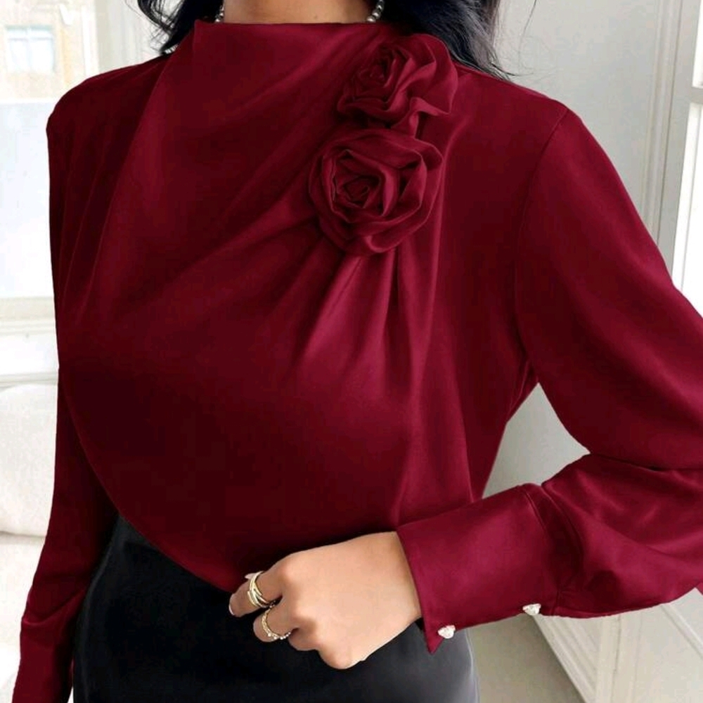 Elegant Burgundy Blouse with Floral Detail.